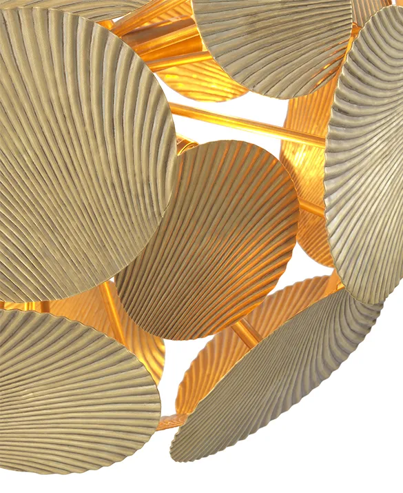 Chandelier Duvall - Chandelier Duvall goes well with a wide range of interior styles, from minimalist to boho. This dynamic modern ceiling pendant has an abstract design and a vintage brass finish. Circular plates of metal with a delicate relief pattern twirl around the frame to create unusual lighting effects.