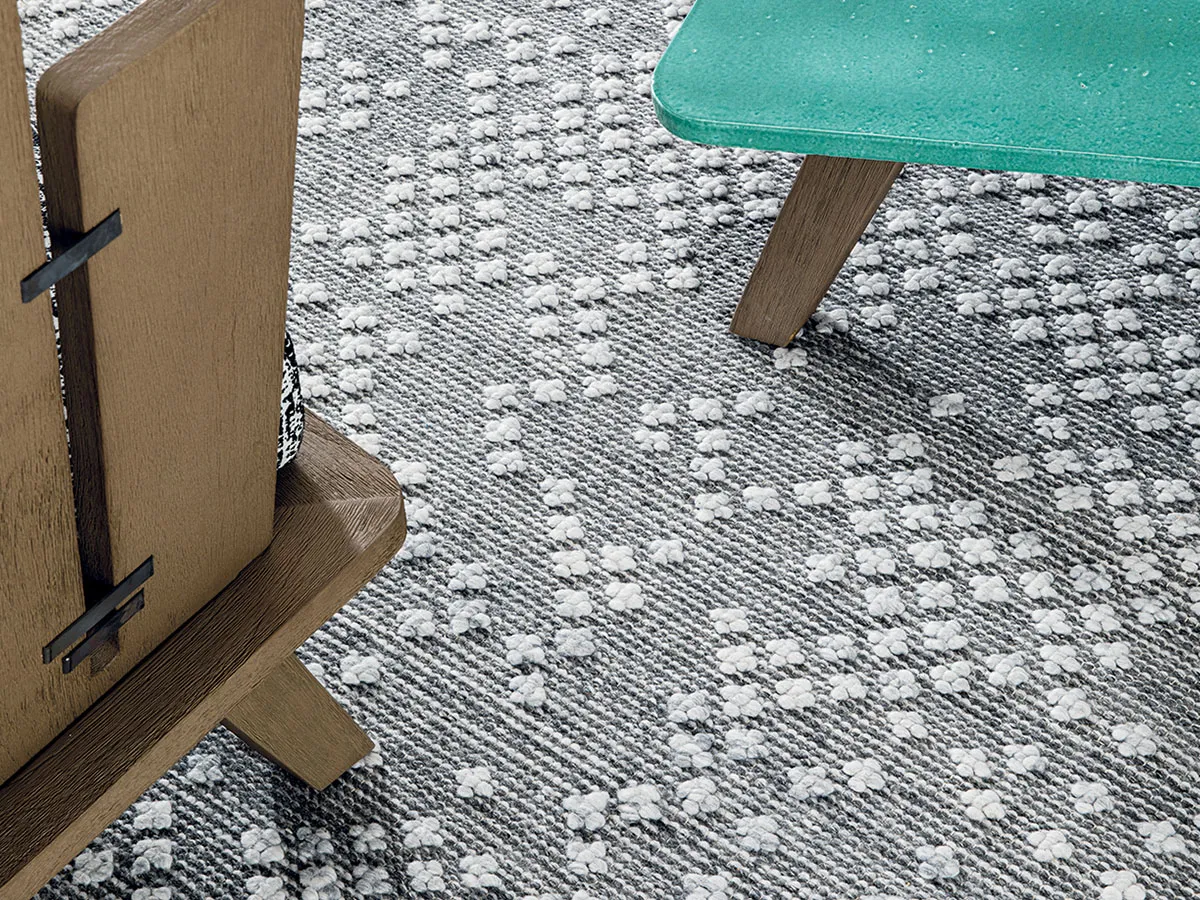 Ethimo - Punto croce rug, design Paola Navone 