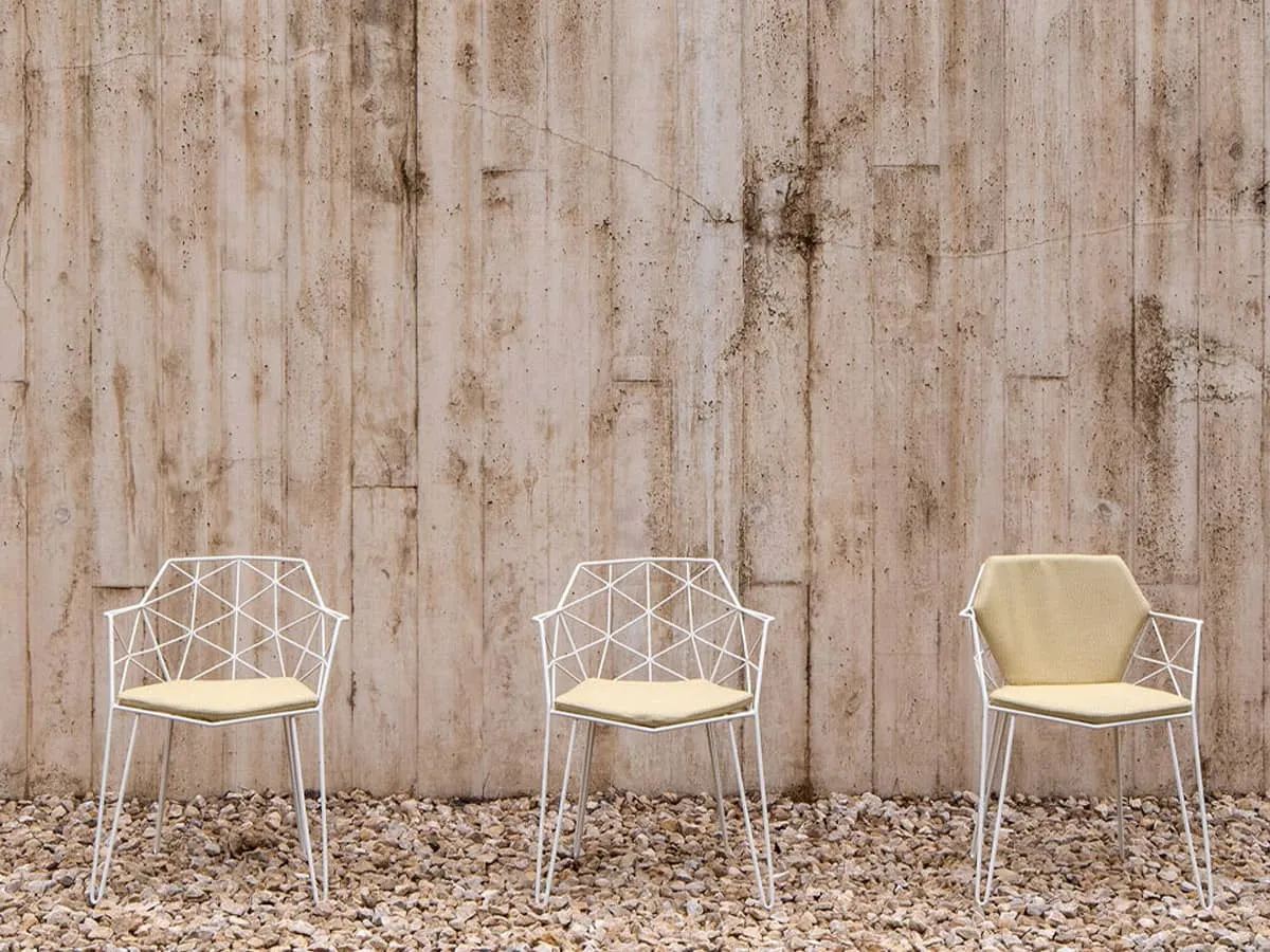 Mitjorn armchair, designed by Ramón Esteve. With simple or double cushion