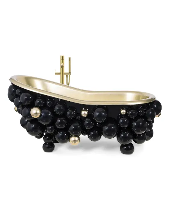 Vasca da bagno Newton realizzata in ghisa verniciata in oro, con tutto il suo interno dorato.