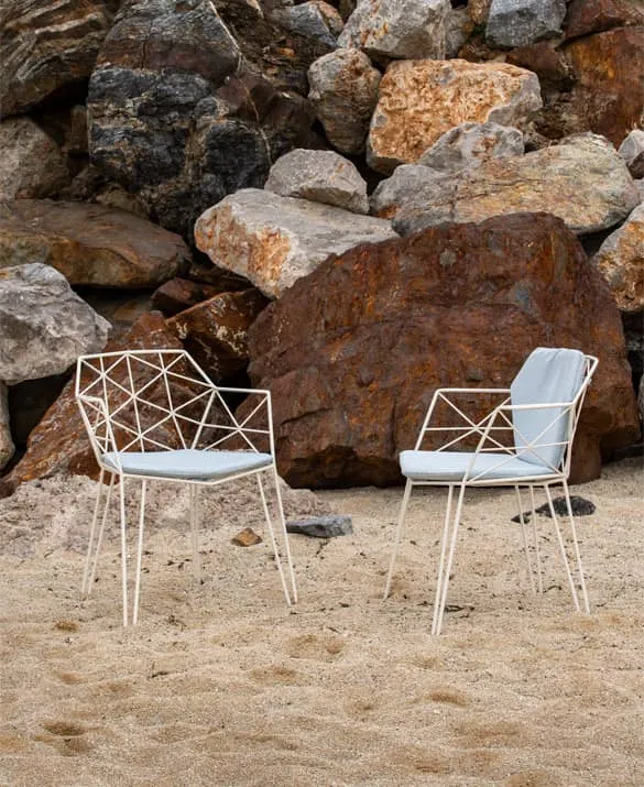 Mitjorn armchair, designed by Ramón Esteve. With simple or double cushion