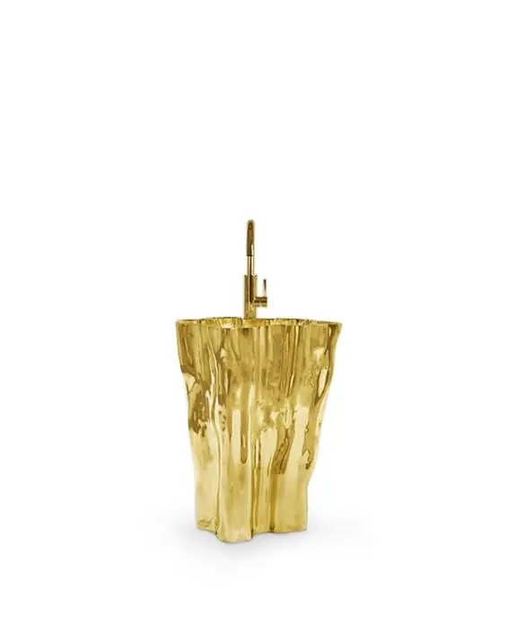 Eden è un lavabo moderno ispirato alla forma di un ceppo d'albero. Questo freestanding dalla forma organica e sorprendente è una meraviglia realizzata in alluminio fuso. Il lavello incorporato ha una speciale superficie ruvida che ricorda gli anelli di crescita, unici e armoniosi, che conferiscono a qualsiasi bagno di lusso una luminosità speciale.